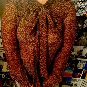 This is a Michael Kors leopard blouse